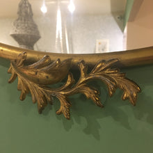 Brass mirror with chain